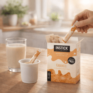 Ein Bild von Instick Milk - Karamell - 12 x 2g, in der Kategorie Nahrungsmittel Instantgetränke
