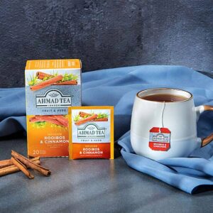 Ein Bild von Ahmad Tea - Rooibos & Cinnamon - 20 Teebeutel à 1.5g, in der Kategorie Früchtetee Afrikanischer Tee Rotbusch und Honeybuschtee Tee im Teebeutel kaufen Tee Koffeinfrei Kräutertee und Gewürztee Tee für den Abend